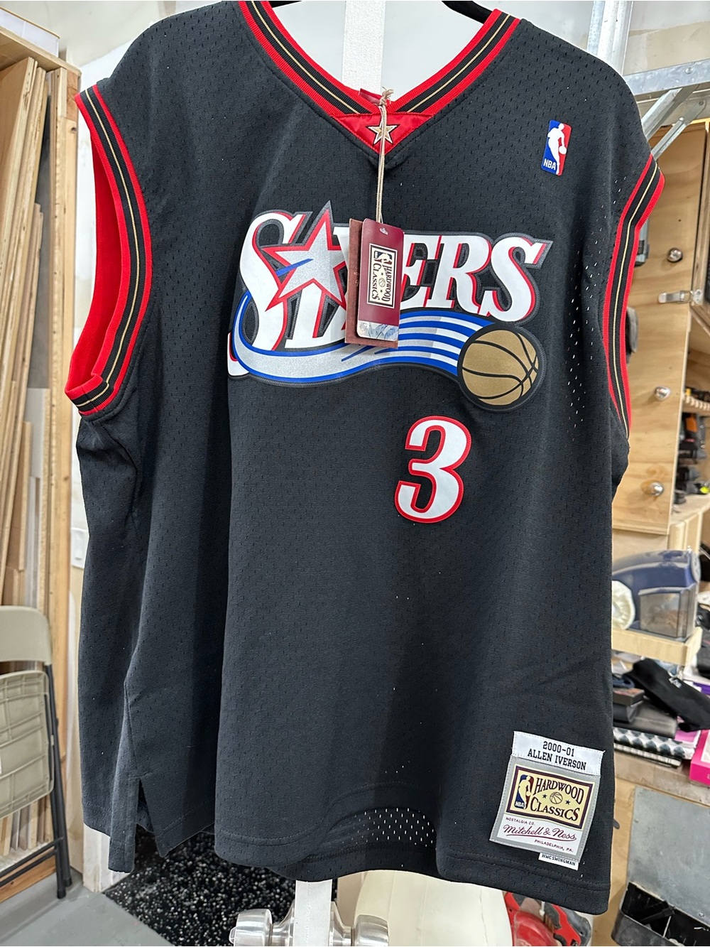 Mitchell & Ness Black NBA Hardwood Classics Tag Detail with Red and Blue Accents